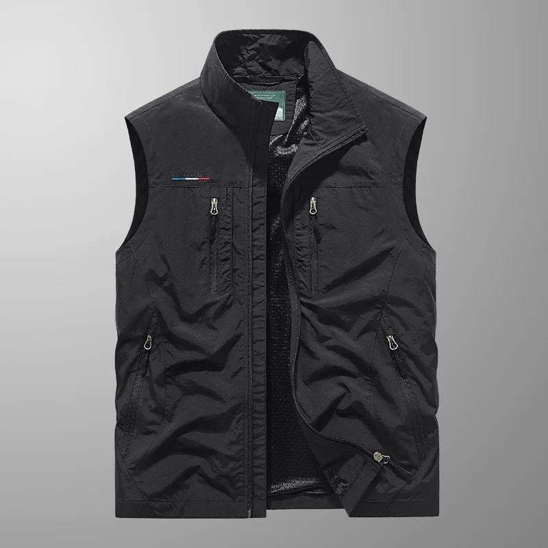 Versatile men's lightweight travel vest with ample storage. Sleeveless design for hiking & outdoor adventures.