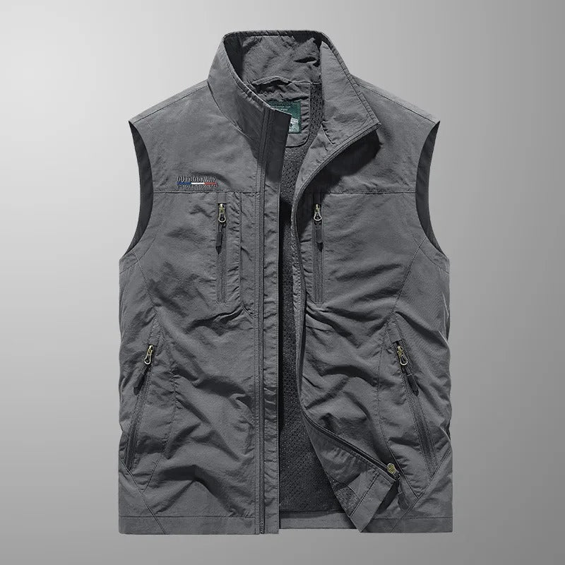 Durable, water & wind resistant men's sleeveless cargo vest. Lightweight design for functional outdoor adventure gear.