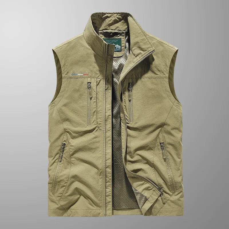 Men's functional sleeveless cargo vest for outdoor adventures. Features multiple zip pockets for secure gear storage.