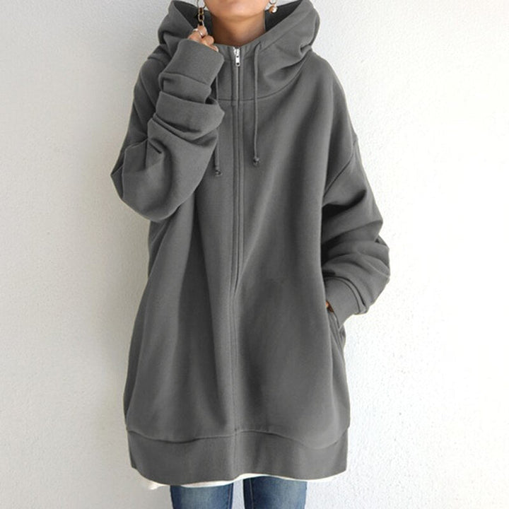 Chic women's oversized hoodie jacket, perfect cozy & versatile outerwear for casual winter fashion.