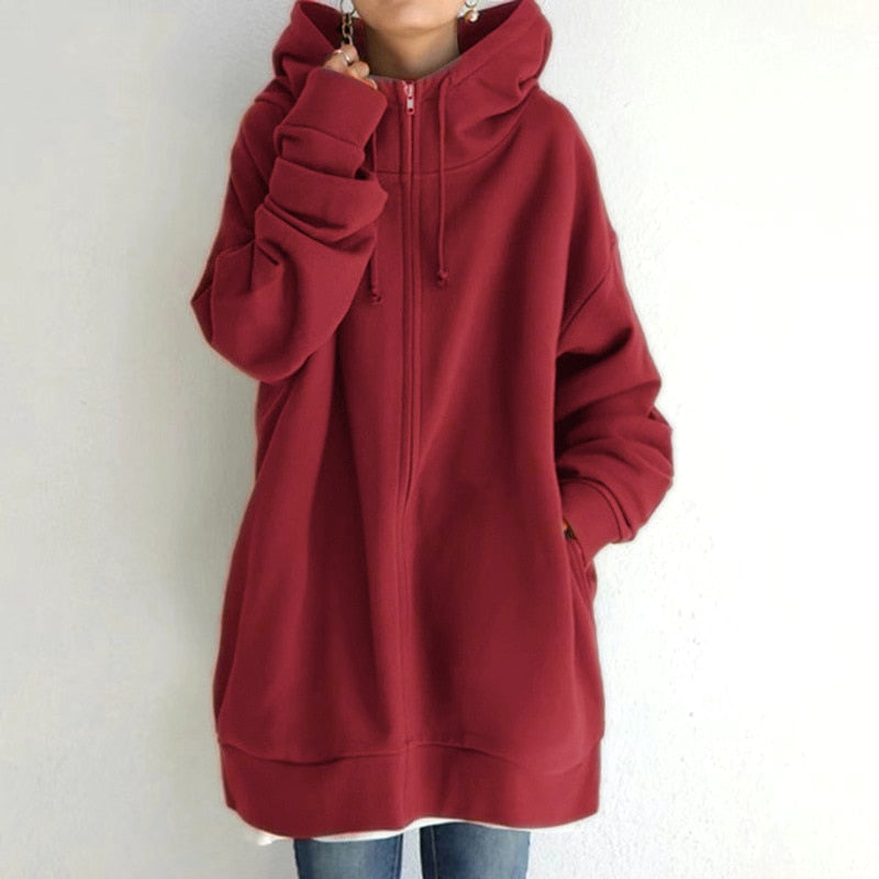 Modern women's oversized hoodie jacket, a cozy layering piece for stylish winter fashion & versatile wear.