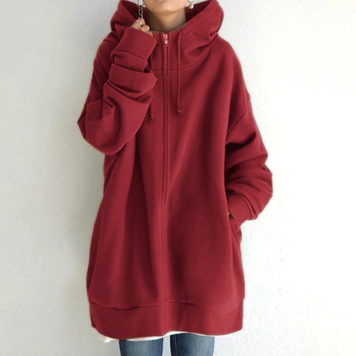 Modern women's oversized hoodie jacket, a cozy layering piece for stylish winter fashion & versatile wear.