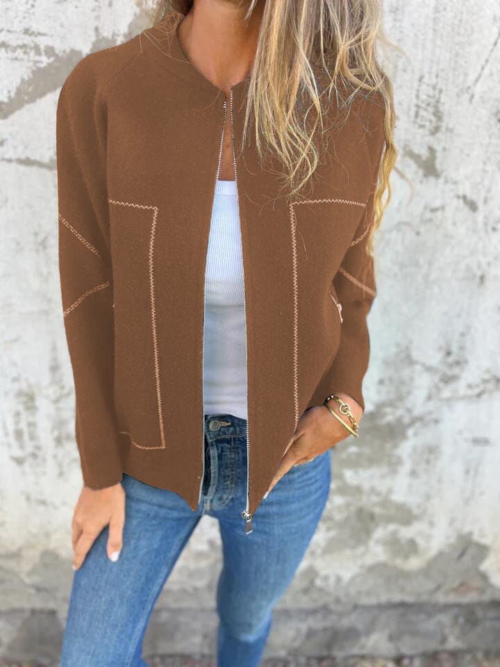 Minimalist women's casual zip vest, a lightweight layering piece for easy, stylish everyday wear.