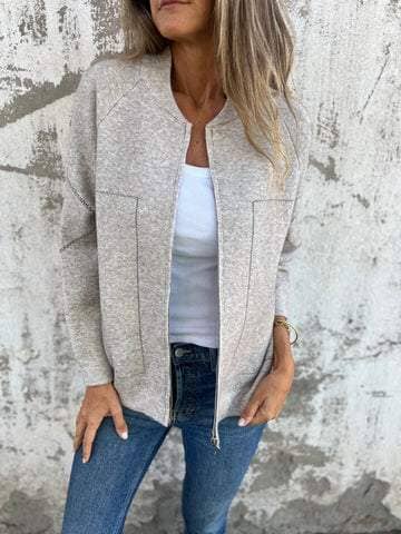 Stylish women's zip vest, a lightweight sleeveless outerwear layer, great for casual fashion.