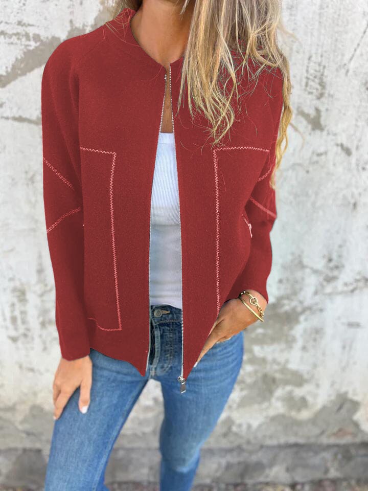 Modern women's fashion vest, a sleeveless zip-up outerwear piece for a chic, minimalist look.