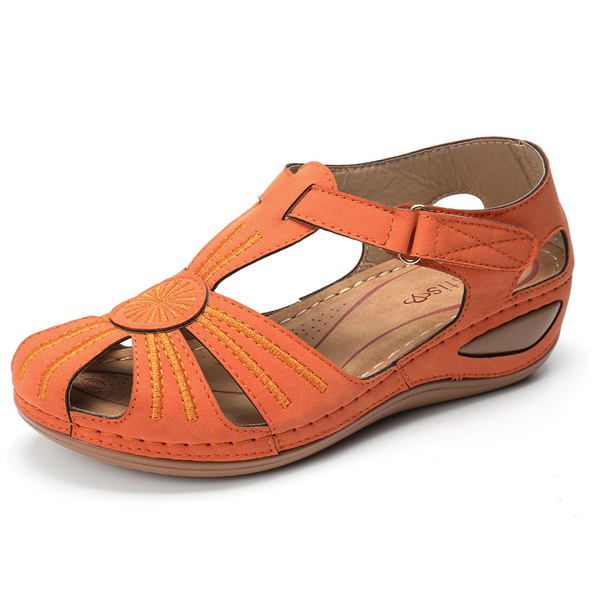 Adjustable strap wedge sandals for women, offering excellent arch support. Comfortable slip-on design for summer fashion.