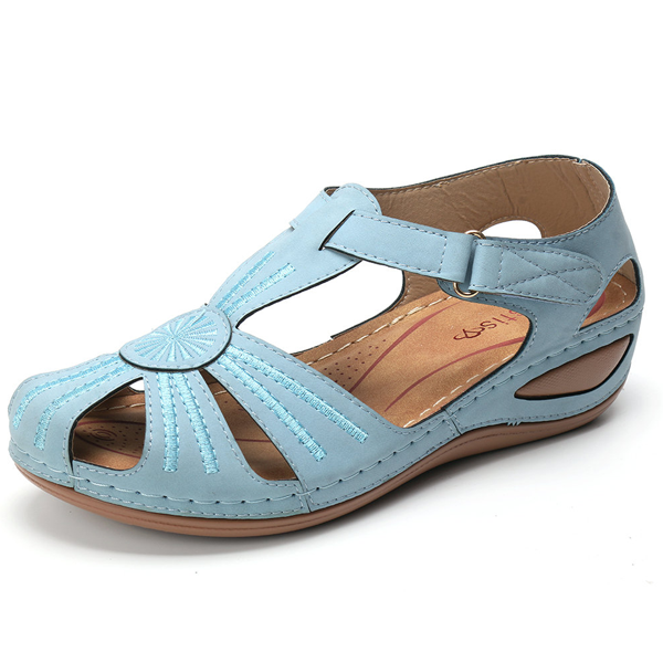 Chic women's wedge sandals with arch support, open-toe design, perfect for comfortable and stylish summer outdoor activities.
