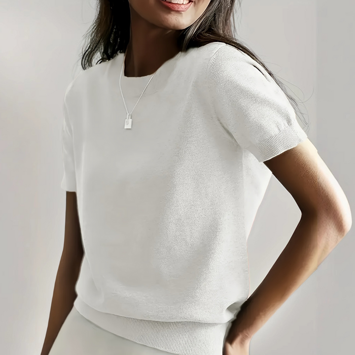 Flattering women's short sleeve crew neck top. Comfortable & versatile for casual wear, a perfect everyday style essential.