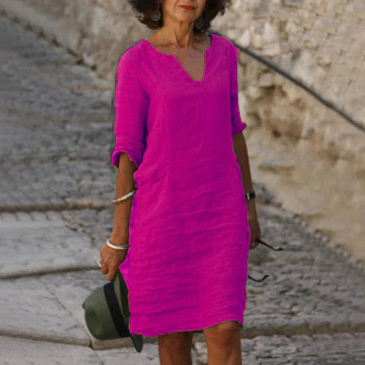 Chic women's midi dress, perfect for casual spring fashion & versatile wear.