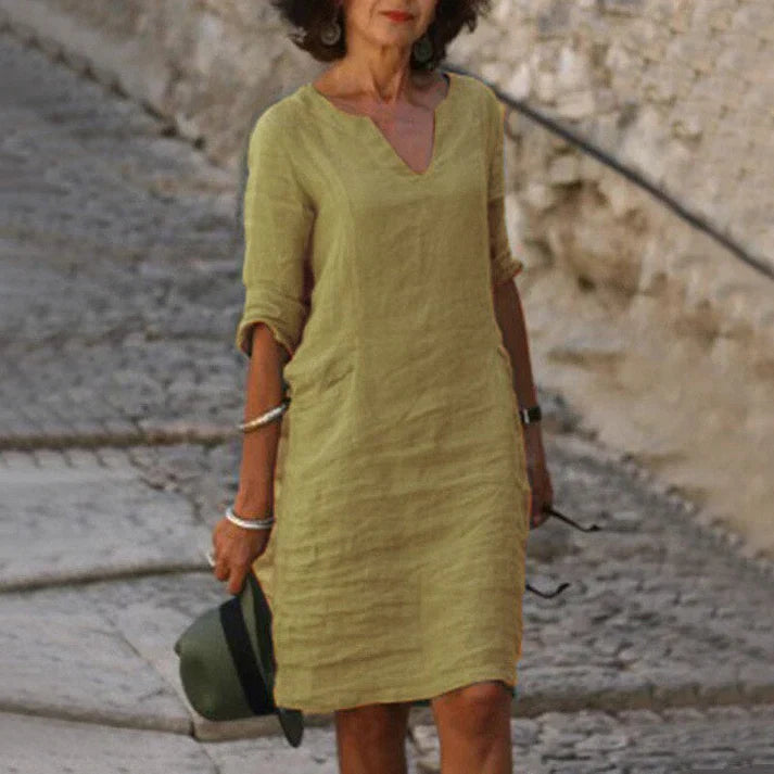 Relaxed fit women's midi dress, perfect for spring and summer casual wear.
