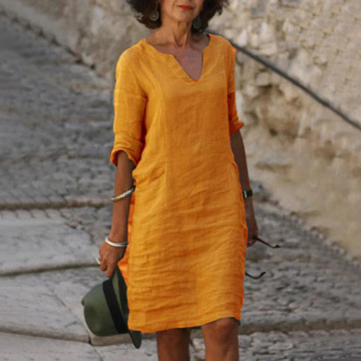 Chic midi dress for women, offering relaxed fit and perfect for summer fashion.