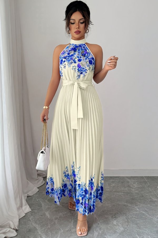 Comfortable women's floral midi dress with a pleated skirt, halter top, and adjustable tie-waist.