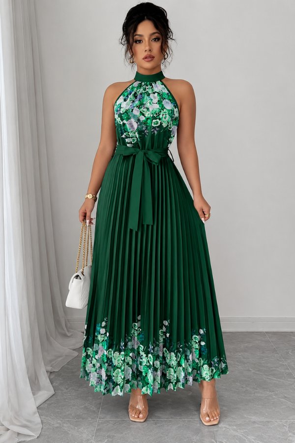 Sophisticated women's floral pleated midi dress with a graceful halter neckline and flattering tie-waist.
