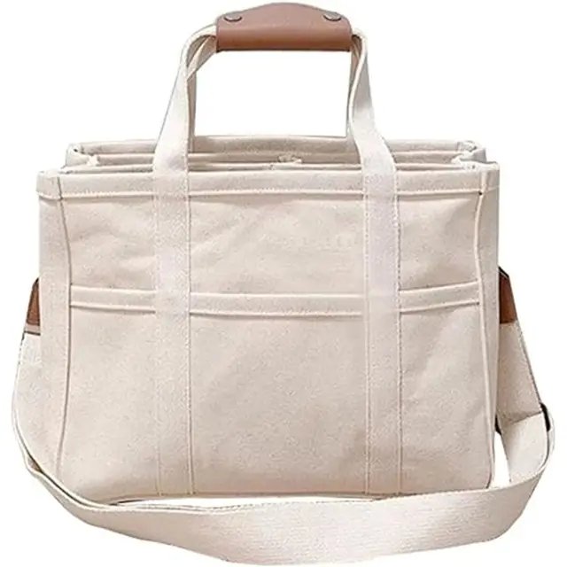 Women's spacious multi-pocket canvas tote bag, perfect for everyday carry & large capacity essentials.