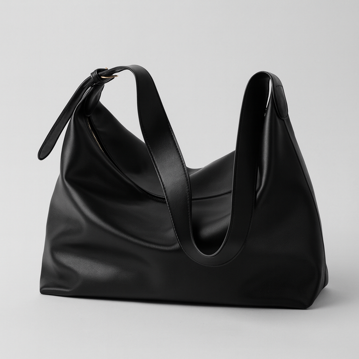 Women's stylish slouchy faux leather shoulder tote bag for everyday fashion.