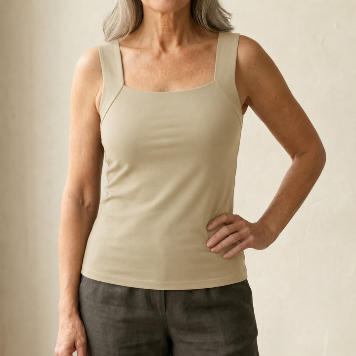 Fitted women's square neck tank top with built-in bra, great for comfortable layering.
