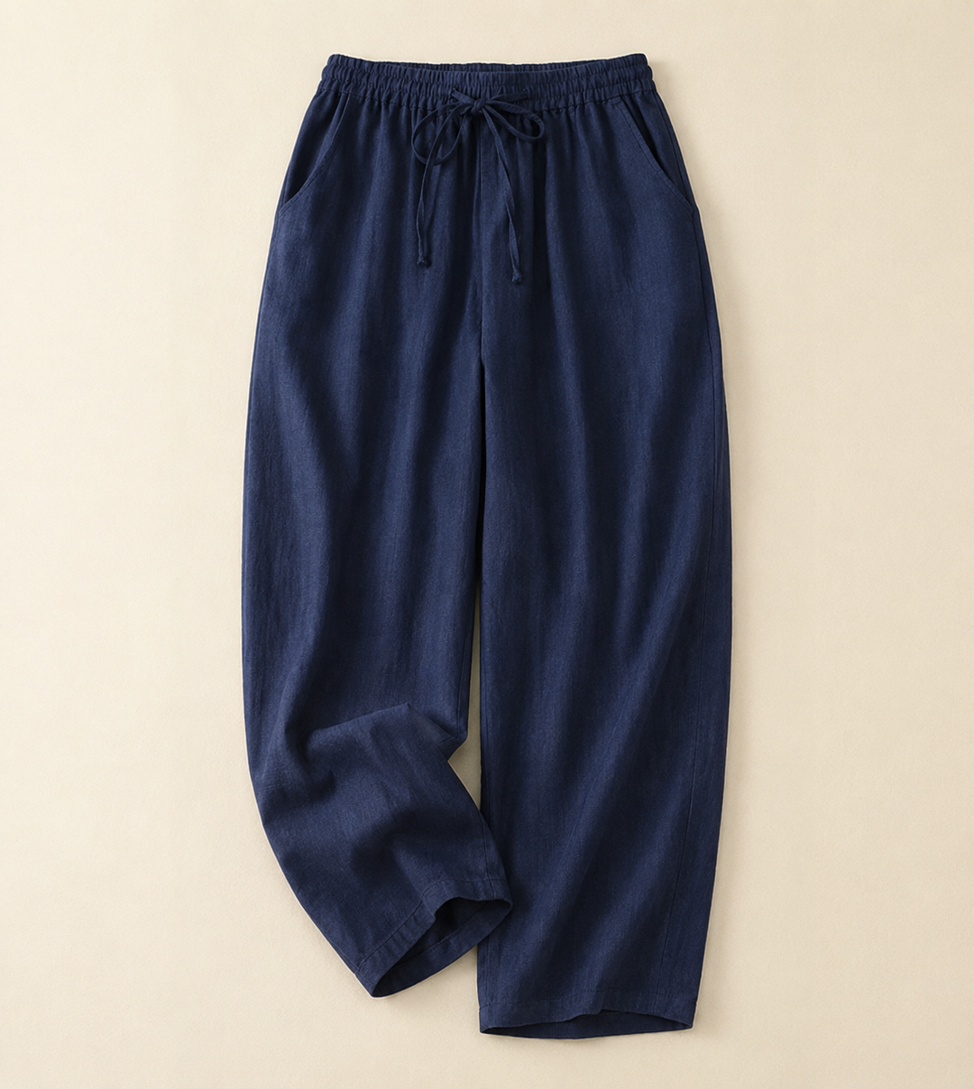 Breathable lightweight women's relaxed fit pants in a neutral color, ideal for casual summer days or travel. Easy care.