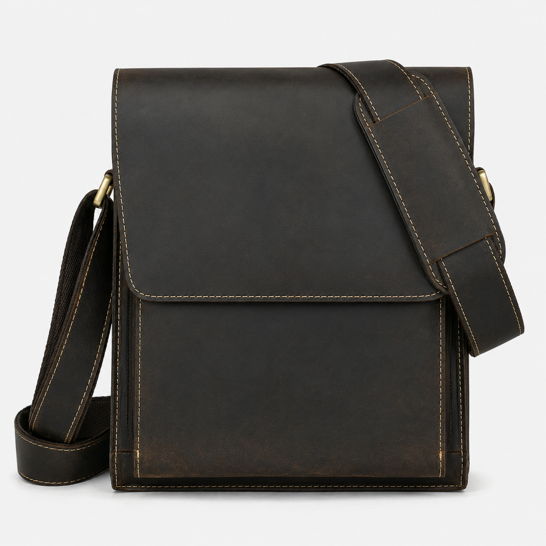 Dark brown faux leather shoulder bag for women, chic design with a functional crossbody strap.