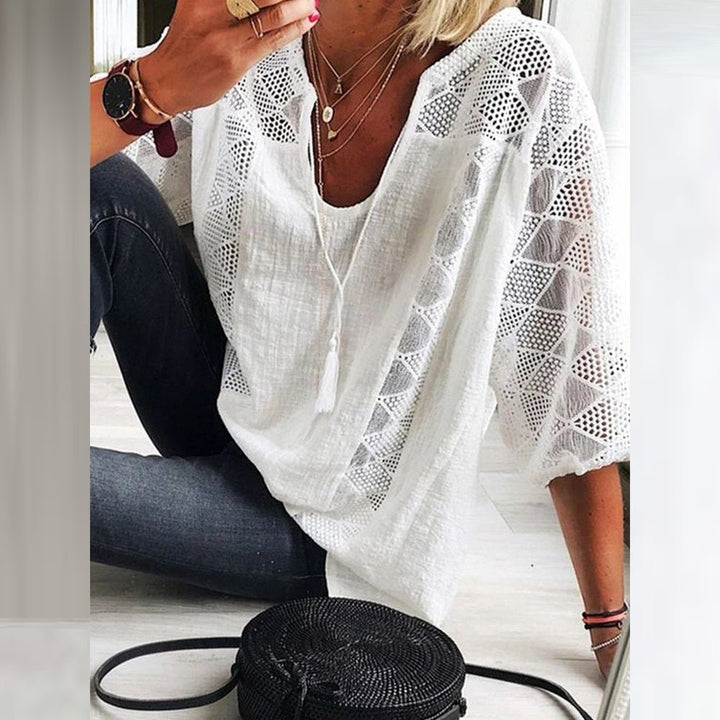 Close-up of the unique detailing on a Chic Accent Women's Blouse, showcasing intricate design for elegant style.