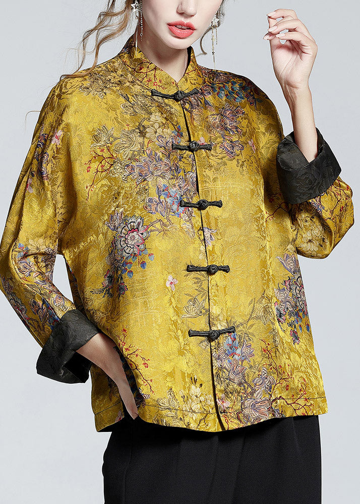 Vibrant printed women's stand collar coat. Elegant long-sleeve fashion outerwear, perfect for making a statement.