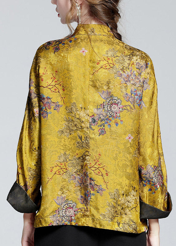 Women's elegant long-sleeve printed stand collar statement coat. Fashionable outerwear ideal for special occasion wear.