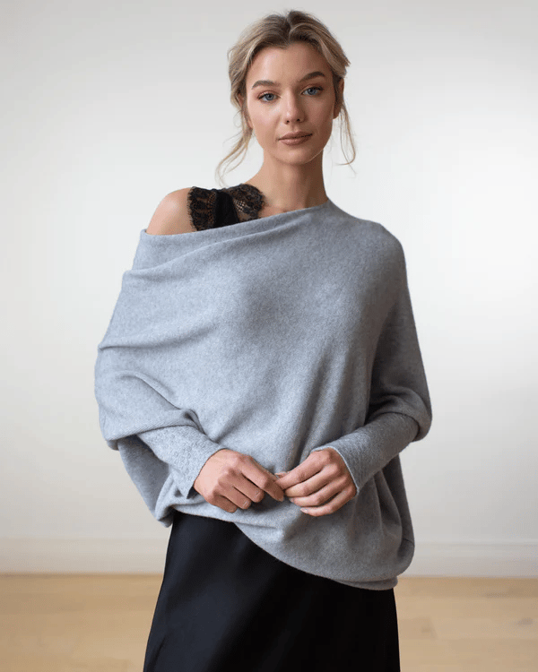 Beige off-shoulder long sleeve sweater for women, elegant knit top, perfect for fall fashion & versatile wear.