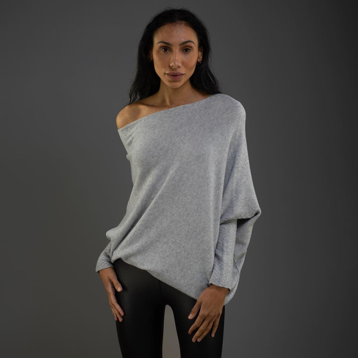 Elegant green off-shoulder sweater, women's comfortable long sleeve knit top, a stylish choice for fall/winter.