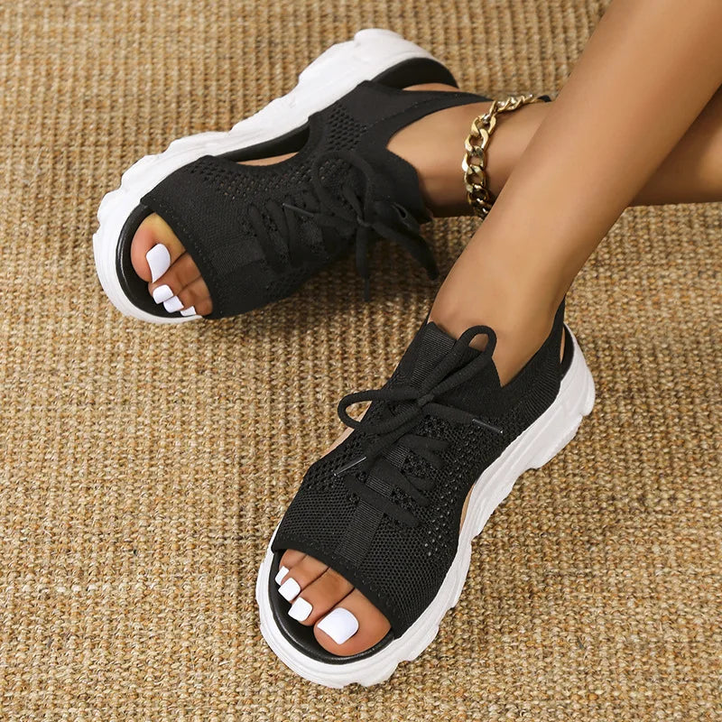 Close-up of cushioned footbed on ergonomic women's sandals, providing anti-fatigue support for summer.