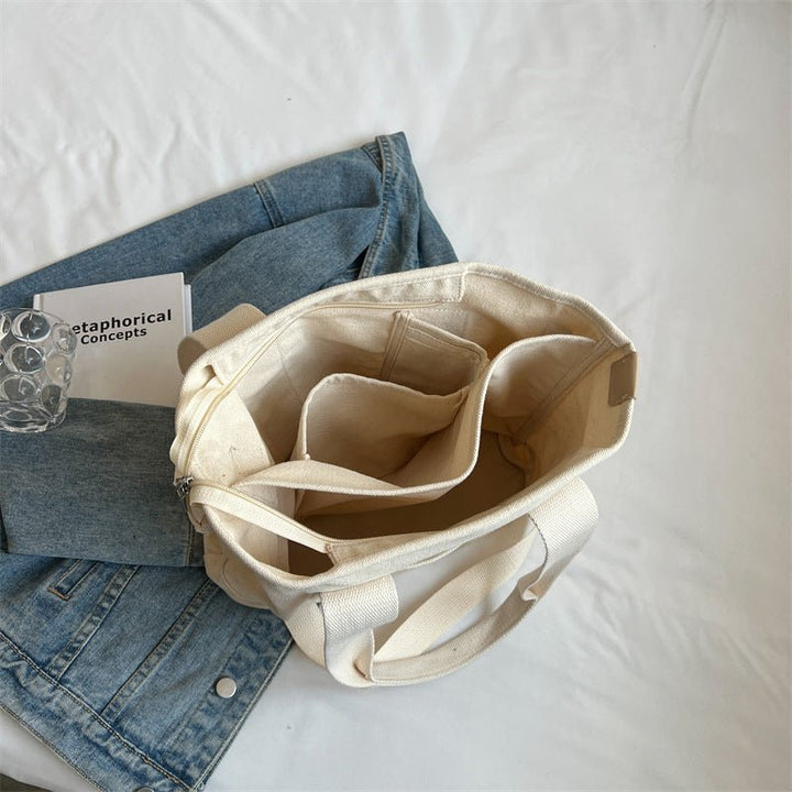 Durable canvas tote bag for women, perfect for everyday use, travel, or a stylish fashion accessory.