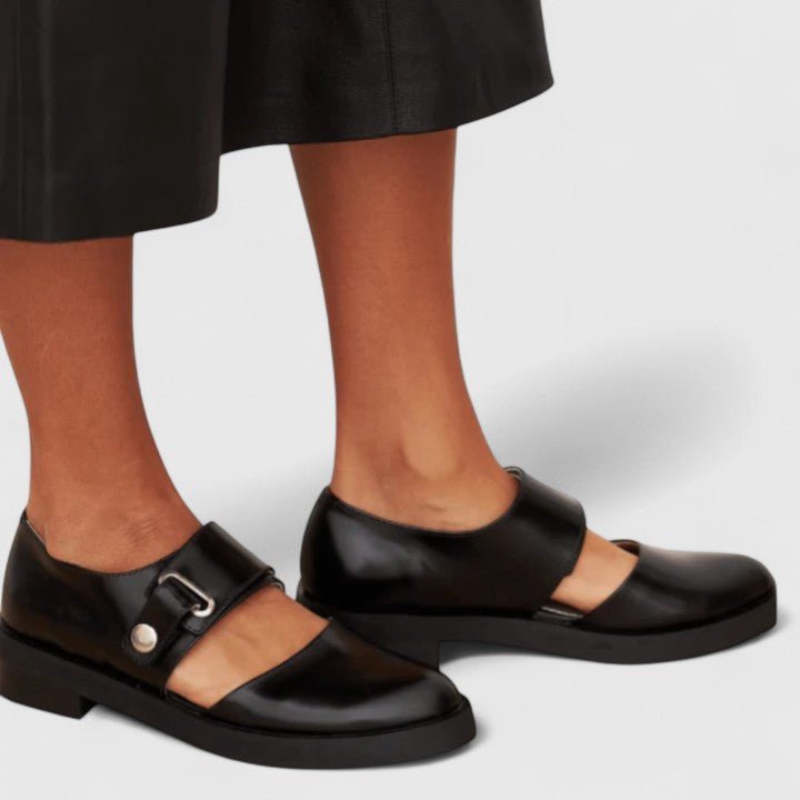 Stylish women's chunky sole Mary Jane platform shoes. Vintage-inspired design with comfortable buckle strap.
