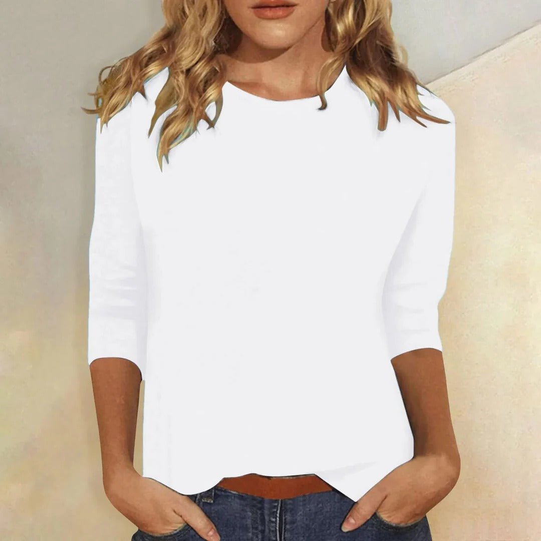 Versatile white crew neck tunic top for women with 3/4 sleeves, perfect for daily wear.