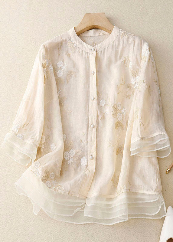 Elegant women's flowing blouse, a comfortable top with a relaxed fit for sophisticated casual chic.