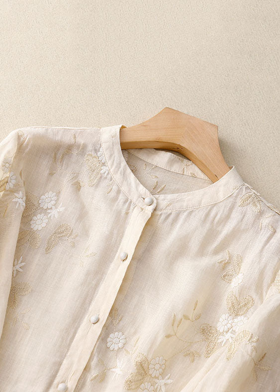 Women's chic embroidered top with a flowing fit, ideal for a comfortable and elegant casual chic look.