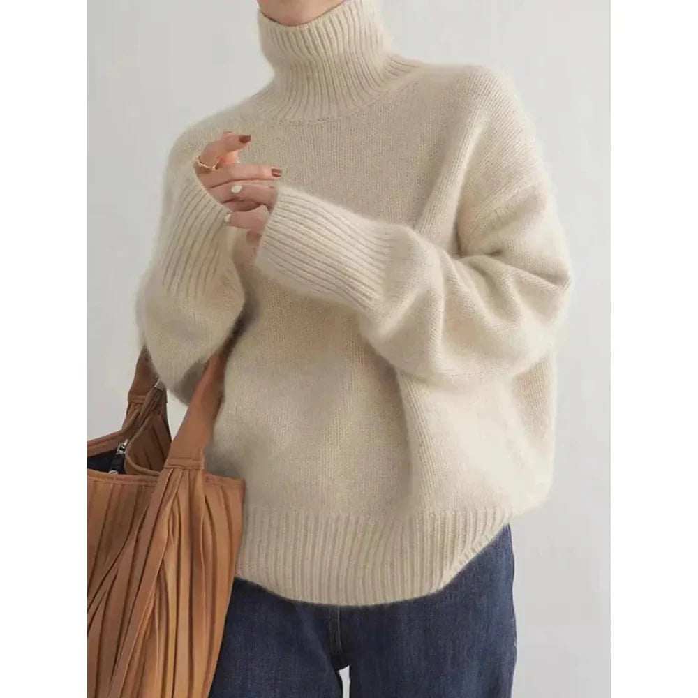Luxurious women's wool turtleneck sweater, perfect for elegant winter warmth.