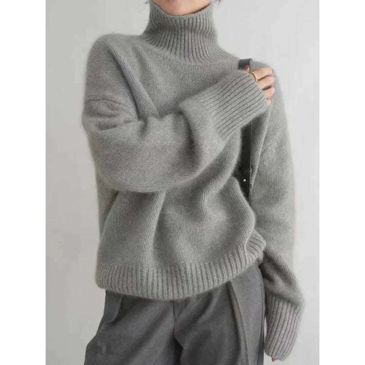 Classic women's elegant wool turtleneck sweater, a timeless piece for winter.