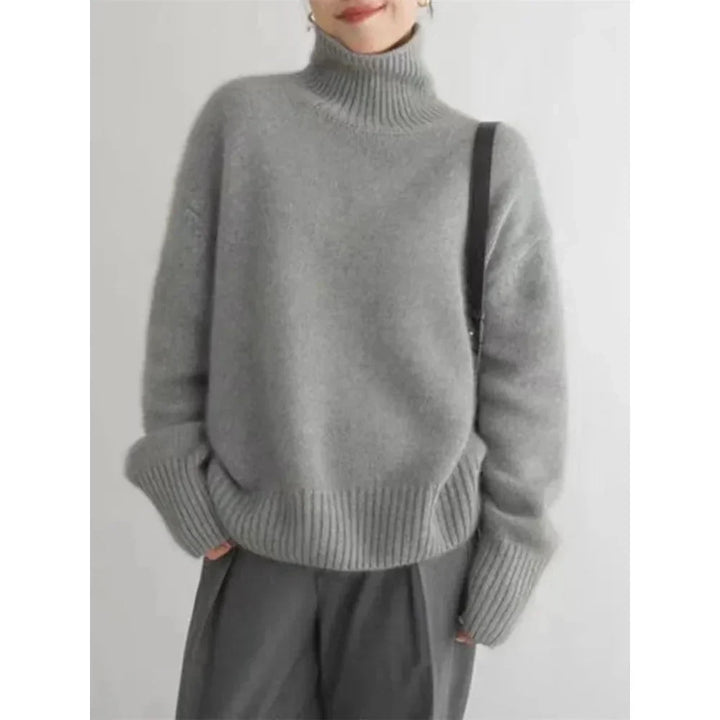 Warm & soft women's wool turtleneck sweater, a cozy classic knit for elegant winter style.