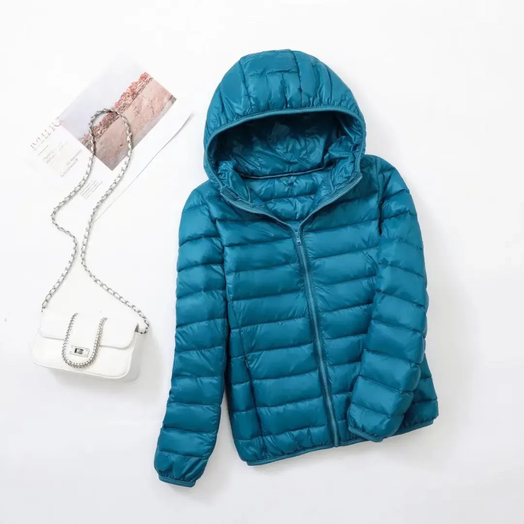 Women's cozy puffer jacket, ideal for warmth, modern fashion, and active winter days.