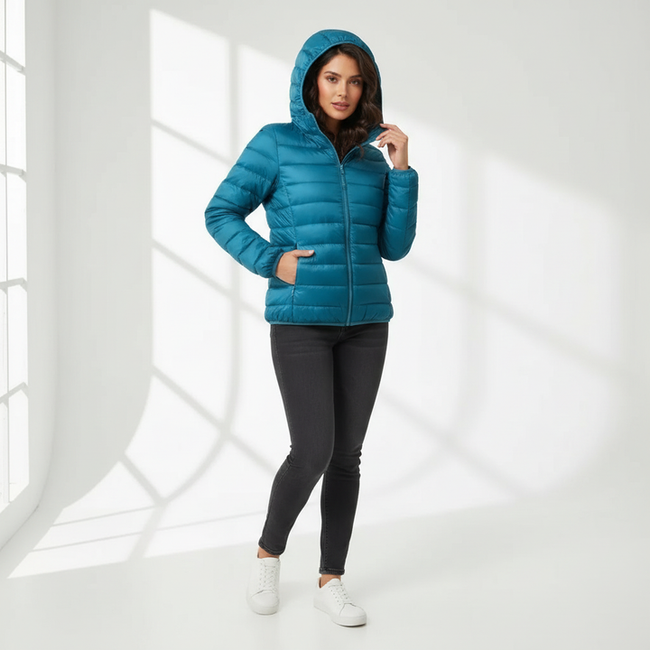 Warm women's sporty puffer jacket, ideal for active fashion and chilly winter days.