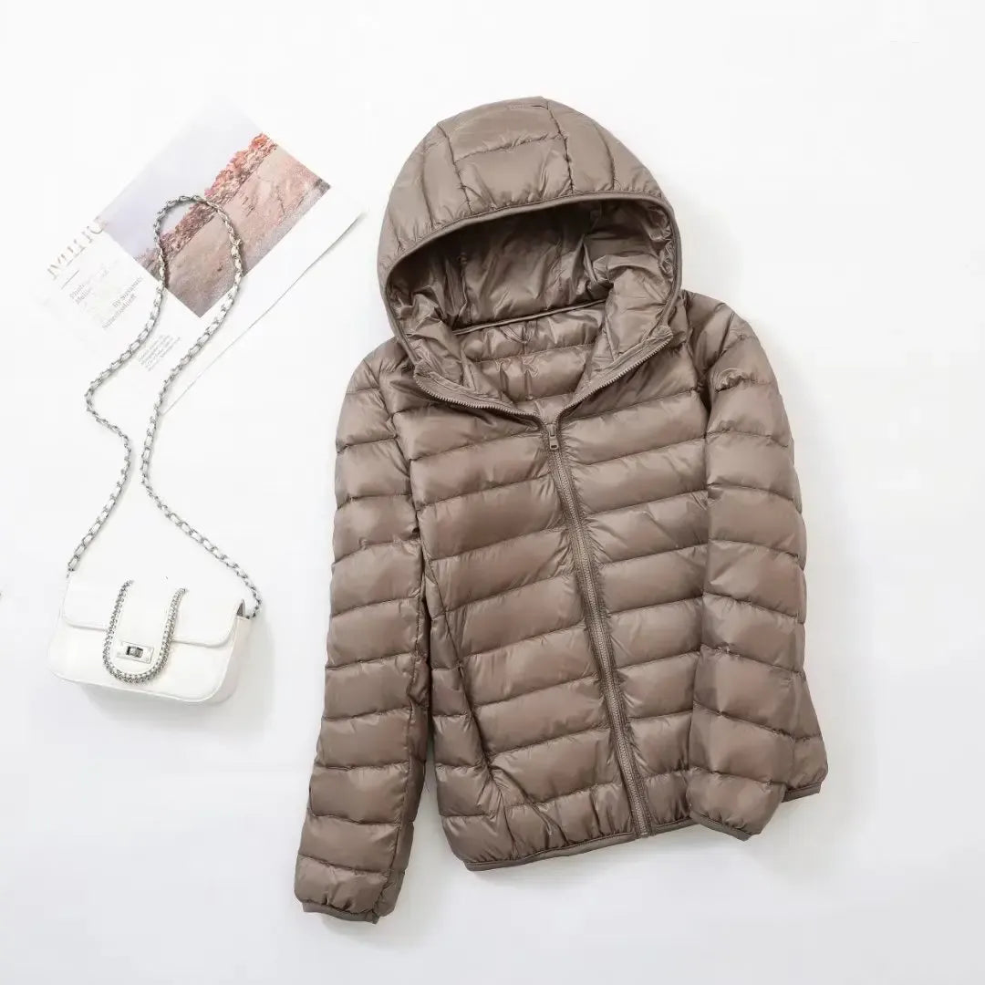 Ladies' warm puffer jacket, a modern and chic choice for active winter and everyday style.
