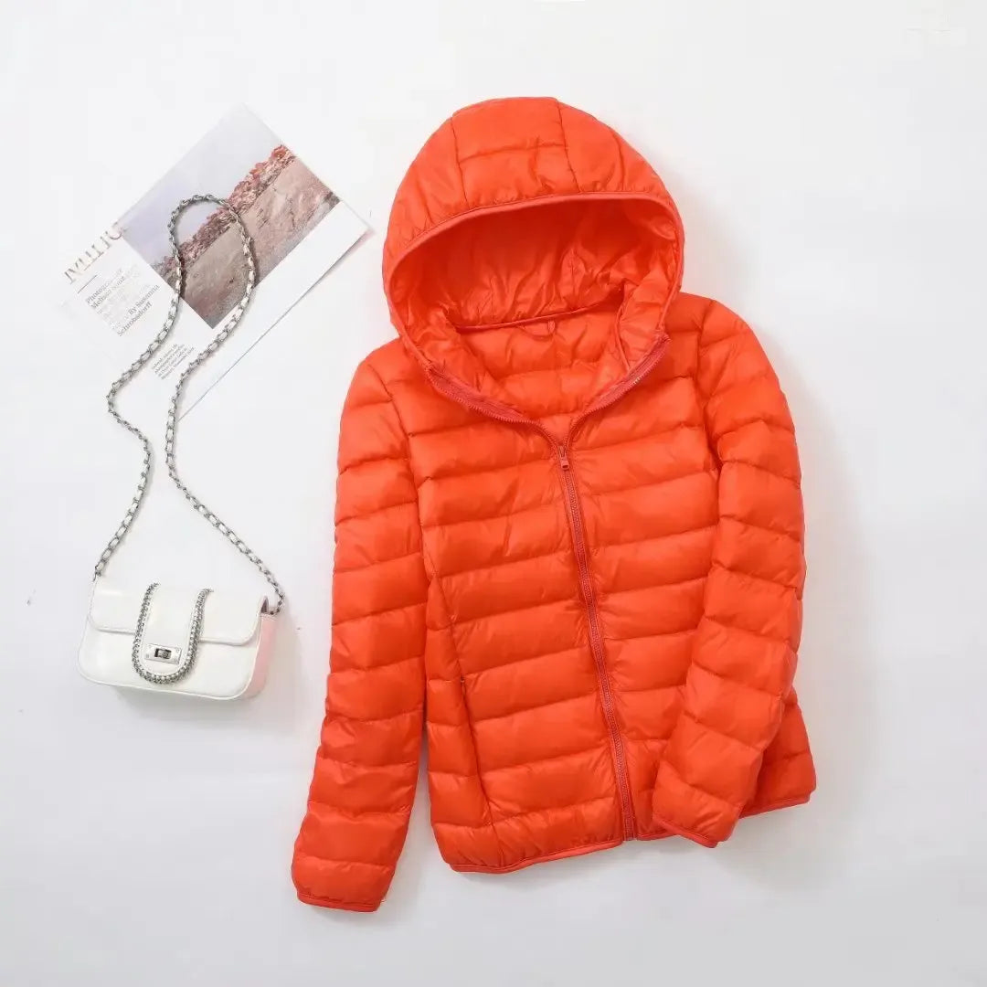 Active women's modern puffer jacket, offering warmth and style for versatile winter outerwear.