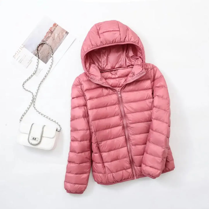 Everyday chic women's puffer jacket, warm, sporty, and fashionable for winter activities.