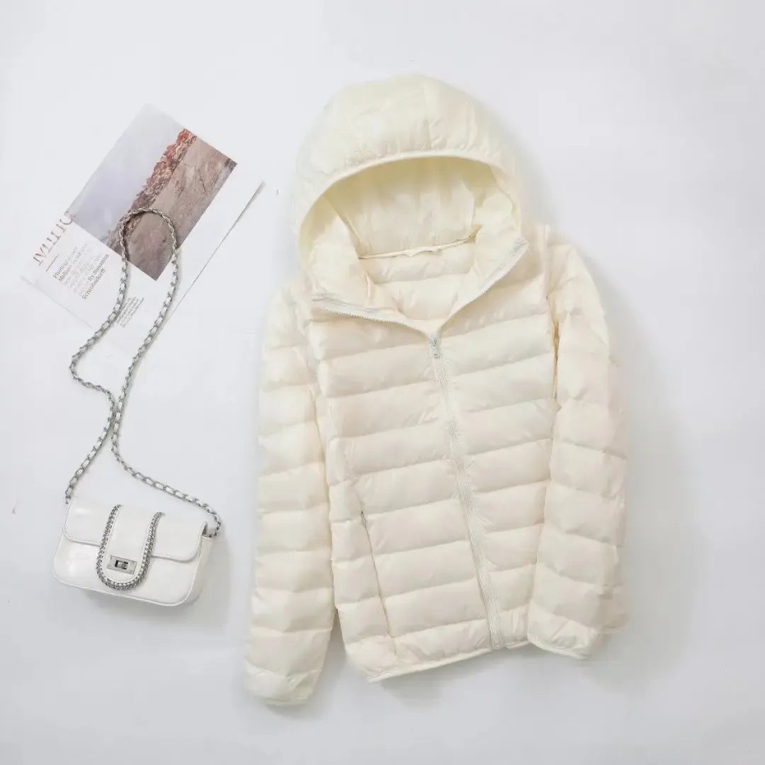 Versatile women's puffer jacket, warm for winter, sporty, and modern for active fashion.