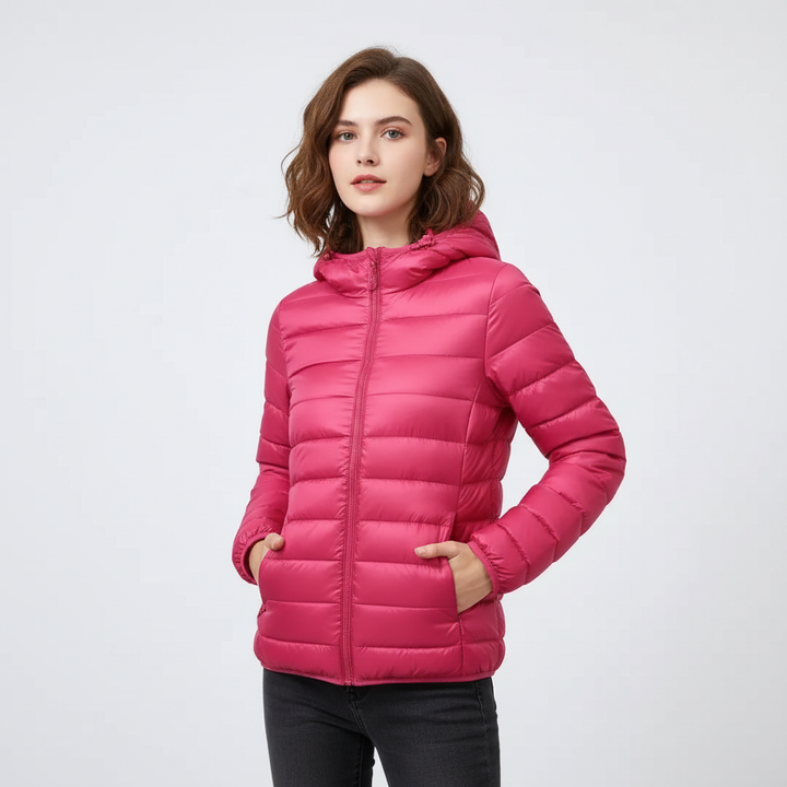 Modern women's winter puffer jacket, combining sporty style with cozy warmth for daily wear.