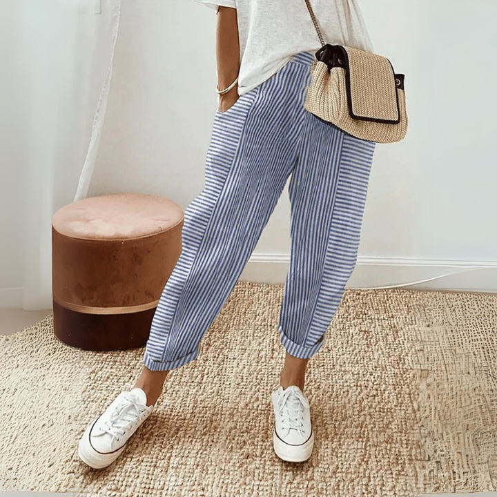 Stylish women's high-waist striped pants with drawstring, offering comfort & a relaxed fit for daily wear.