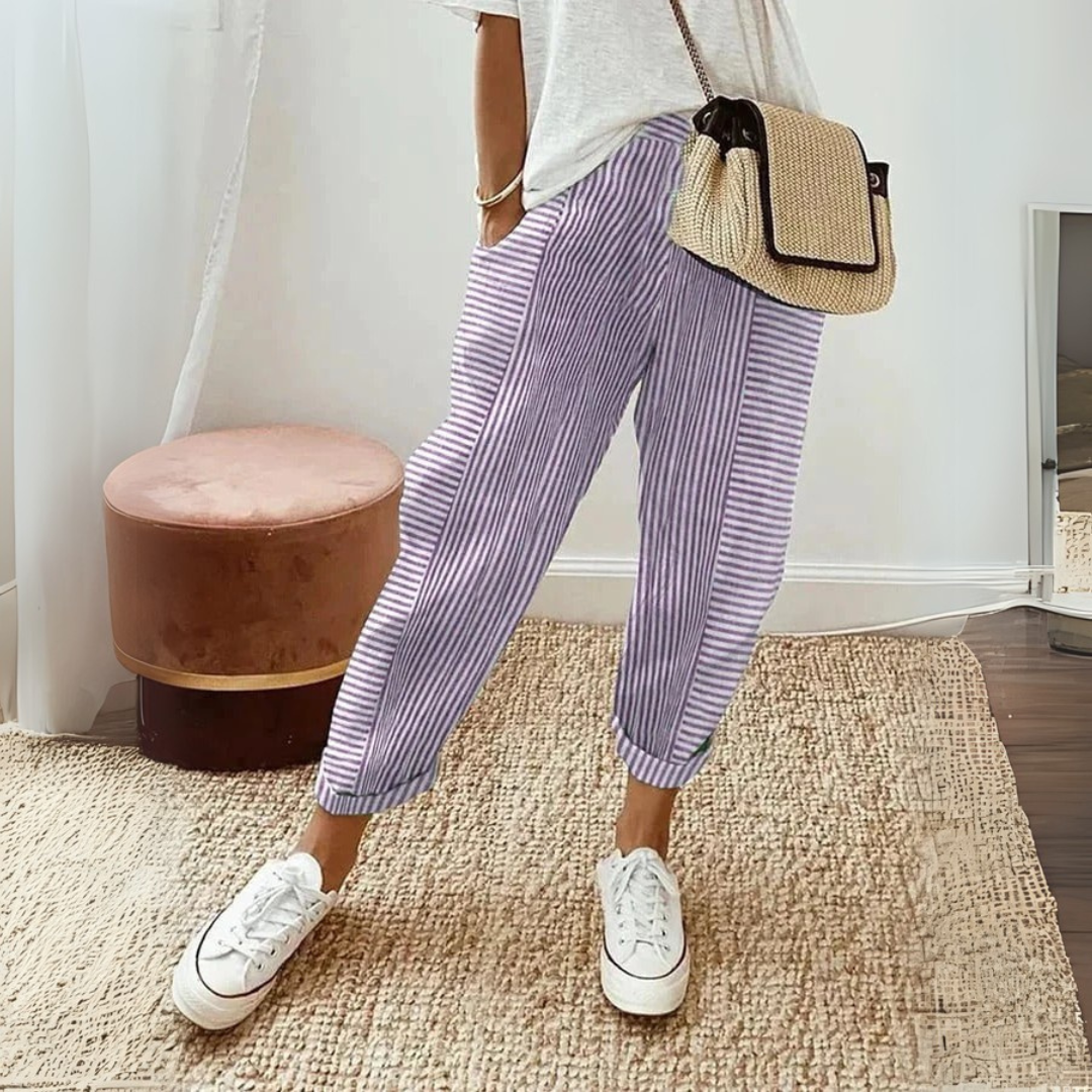 Soft women's striped casual pants with pockets & an adjustable drawstring, great for comfortable everyday style.
