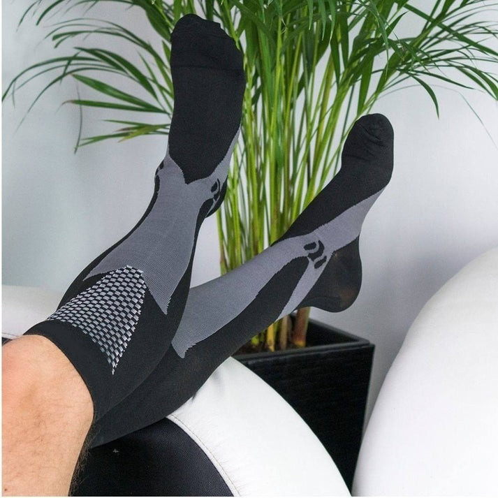 Compression socks for varicose veins, edema, & plantar fasciitis relief. Unisex design for leg support.