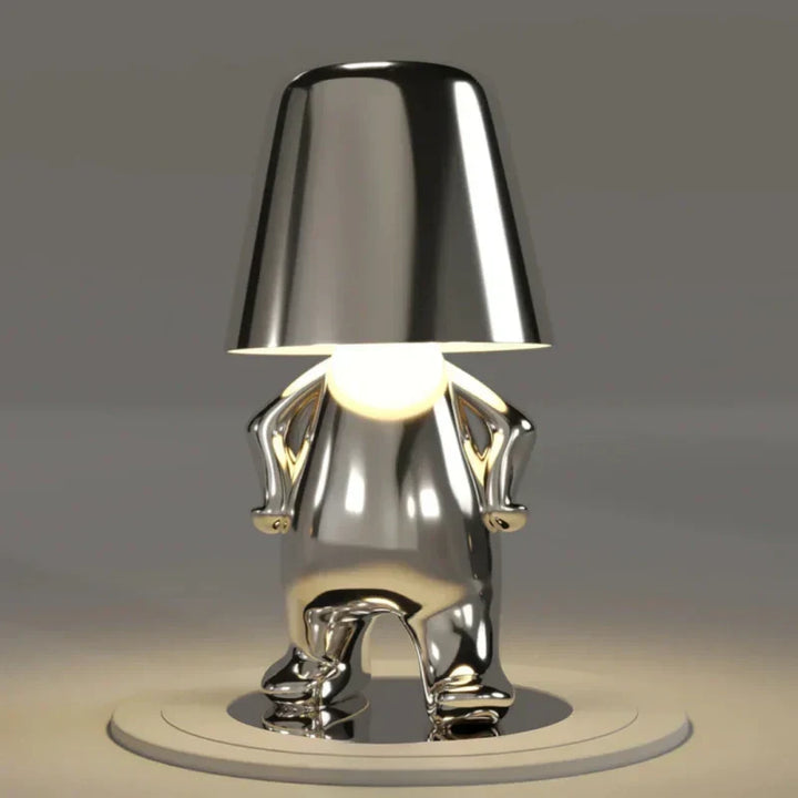 Portable LED light: Dimmable figurine lamp. USB rechargeable & artistic resin statue design.