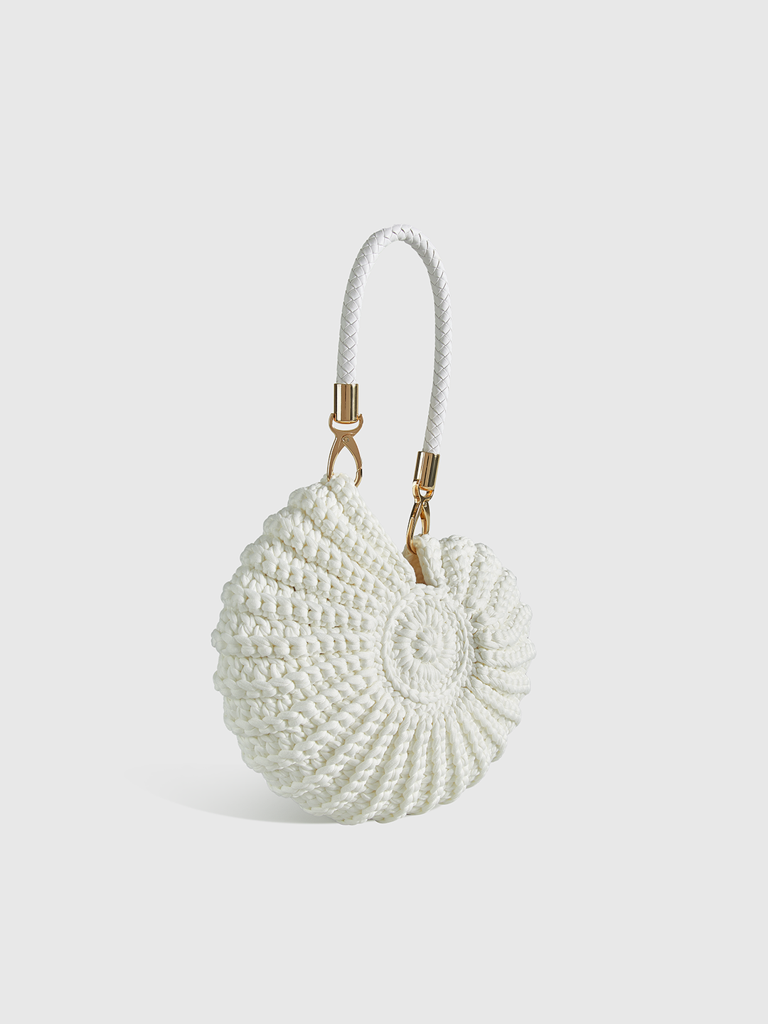 Stylish women's crochet conch bag. Unique design, perfect as a shoulder or crossbody handbag. Polyester material.