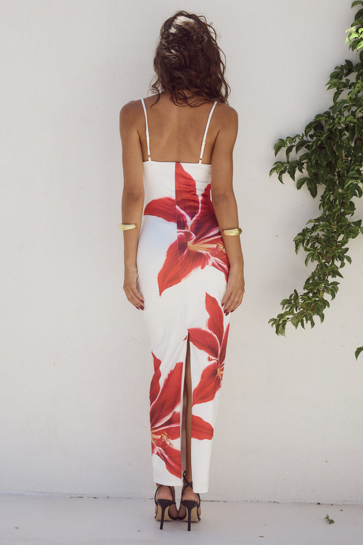 Stylish women's bodycon midi dress with vibrant flower print, ideal for spring.