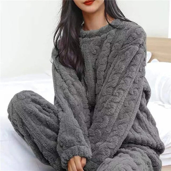Cozy women's two-piece lounge set. Ultra-soft pajamas for ultimate comfort and relaxation at home.